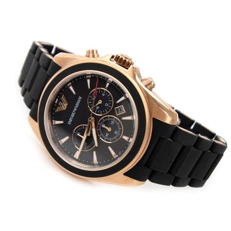 gold watch with black strap